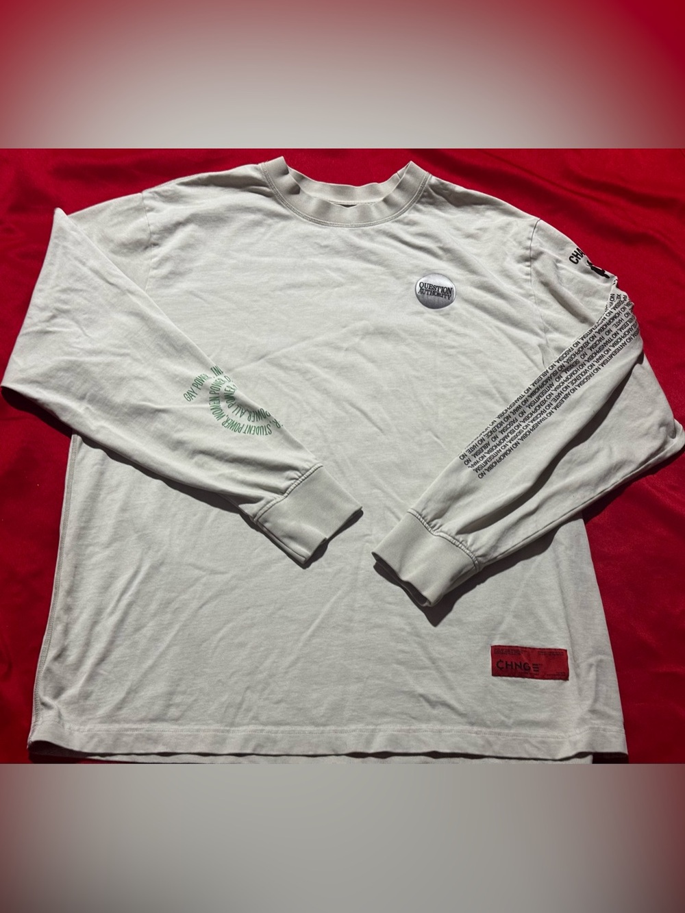 CHNGE Cream Long Sleeve Tee with Green Sleeve Print and Red Hem Patch